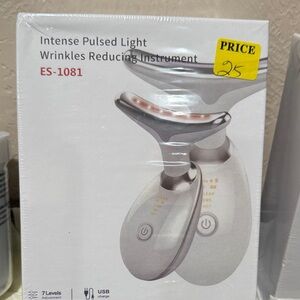 White Skincare Tool with Rose Gold Accent